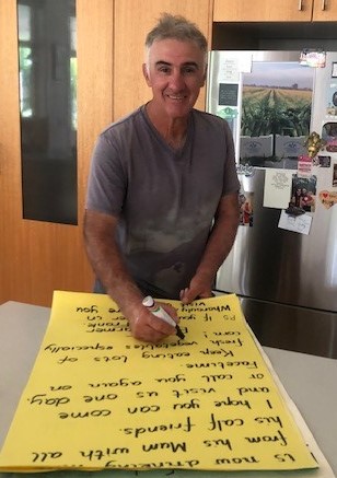 Farmer Frank writing a letter back to Year 1 students